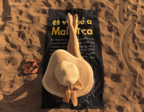 girl-sunbathing-on-a-beach-towel-template-a14887